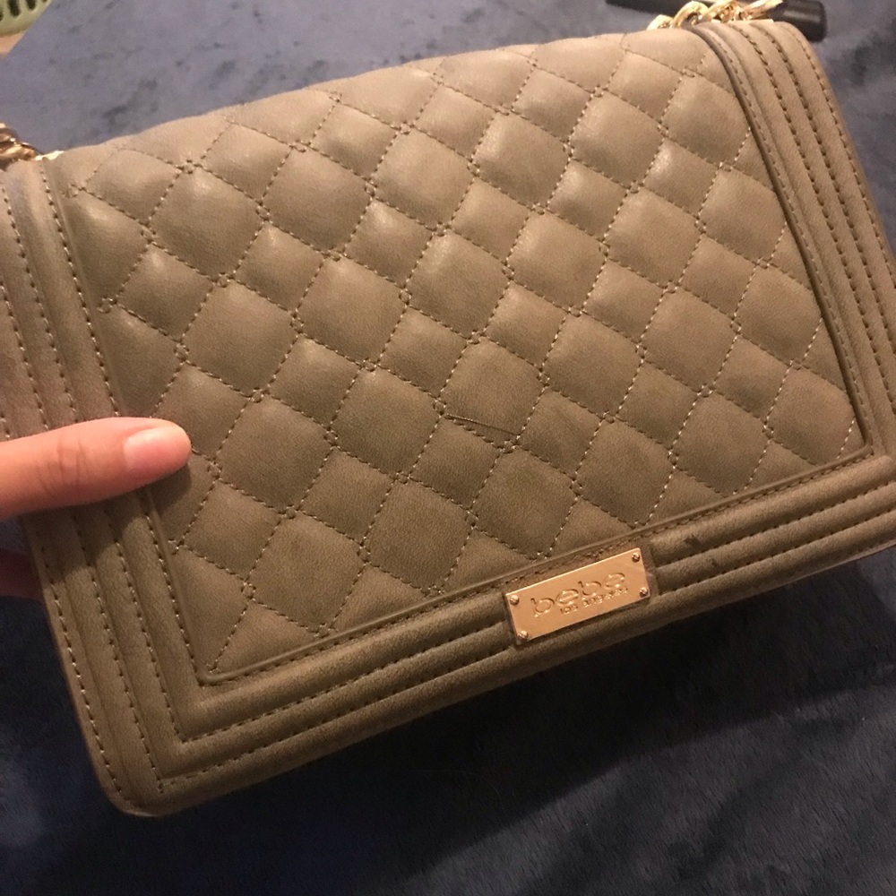 New never worn olive colored  quilted Bebe